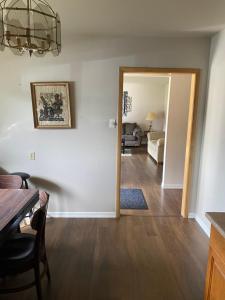 a living room with a dining table and a living room at Home sweet home in Thunder Bay