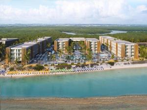 an aerial view of a resort on a beach at Flat em Porto life Resort in Porto De Galinhas