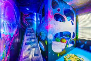 a childrens room with a play room with a play room at Windsor Resort Private Pool & Theater Game Room in Davenport