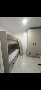 an empty white refrigerator with its door open at Apartamento alhelí 2 in Barbate