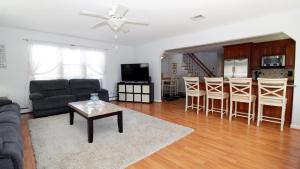 a living room with a couch and a table at Life S A Beach in Cape May