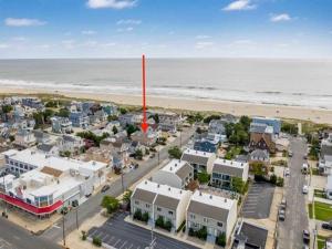 an aerial view of a beach with a red pole at Ocean Block Wifi Beach Badges Ship Bottom in Ship Bottom