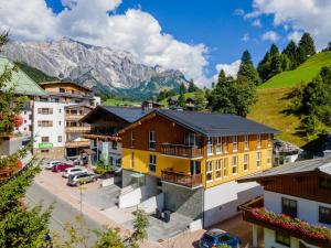 a view of a town with mountains in the background at Emma Top 2 in Dienten am Hochkönig