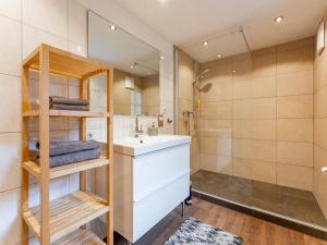a bathroom with a sink and a shower at Kitzbüheler Alpen XL in Bramberg am Wildkogel +49 photos