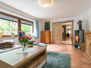 a living room with a couch and a table at Am Inn Fluss in Langkampfen