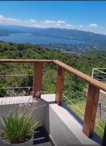 a balcony with a view of the ocean at Departamento Tierralta in Malagueño