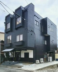 a black building with a black at HAOSTAY Eirin in Fujikawaguchiko