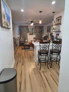 a kitchen with a table and chairs in a room at Brooklyn Luxury Suite in Brooklyn +40 photos