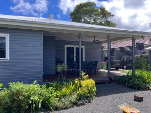 a covered porch of a house with a patio at Hathaway House in Toowoomba
