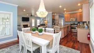 a kitchen and dining room with a table and chairs at 1036 Maryland Ave in Cape May