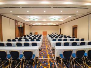 a large room with rows of tables and chairs at Hotel Keihan Universal Tower in Osaka +66 photos