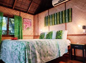 a bedroom with a bed in a room at Le Vasa Resort in Fuailalo +90 photos