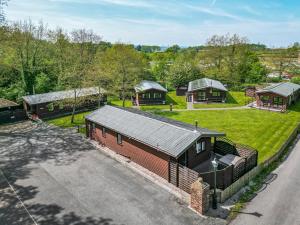 an overhead view of a house with a driveway at Clwyd Cottage in St Asaph
