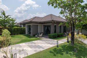 a rendering of a house with a garden at Mango Villa แมงโก้ วิลล่า in Sa Kaeo