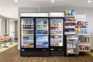 a refrigerator filled with lots of food and drinks at Spark by Hilton Virginia Beach Oceanfront in Virginia Beach