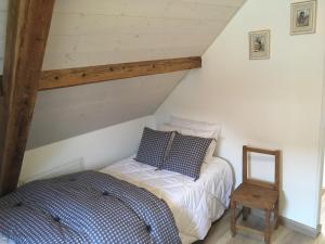 Postel nebo postele na pokoji v ubytování Gîte sainte Famille