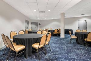 a conference room with black tables and chairs at Comfort Inn Eagan Minneapolis - St Paul South in Eagan