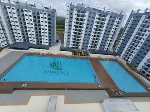 an aerial view of two large apartment buildings at MyShelter Melaka in Kelebang Besar