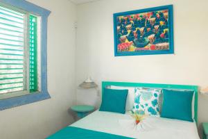 Voodi või voodid majutusasutuse Hotel Playa Colibri toas