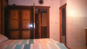 Postel nebo postele na pokoji v ubytování Apartments T&M