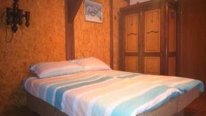 Postel nebo postele na pokoji v ubytování Apartments T&M
