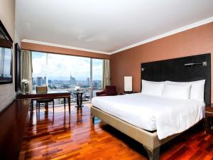 Легло или легла в стая в Pullman Bangkok Hotel G + 129 снимки