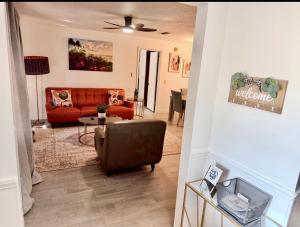 a living room with a couch and a table at Island 1 in Kissimmee