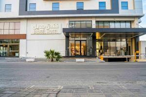 a store front of a building with a street in front at فندق جديل2 - Jadeel Hotel 2 in Al Khobar