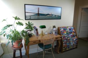 an office with a desk with a picture of a bridge at The Willows Inn in San Francisco