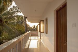 a view from the balcony of a house at Fatima's Guesthouse in Agonda