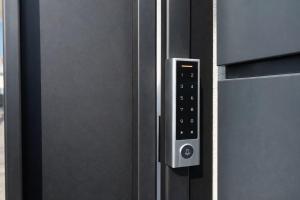 a close up of a stainless steel refrigerator door at Seranova Aparthotel 10 SELF CHECK-IN #Otopeni #Airport #Therme #Bucharest in Otopeni