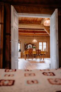 a dining room with a table and chairs at Smykowe Doły in Wilczyce