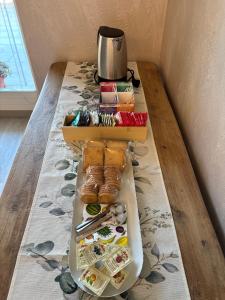 a table with a tray of food on a table at La Piazzetta in Sondrio
