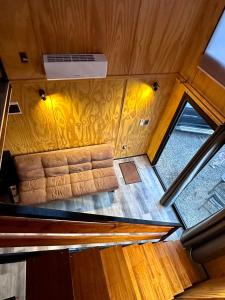 an overhead view of a living room in a tiny house at Barra Loft in Piriápolis