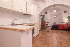 a kitchen with a sink and a counter top at Boschetto 58 in Rome