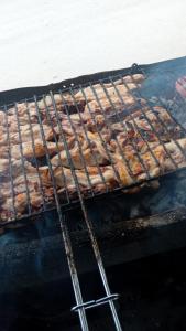a grill with a bunch of food on it at Auberge Chez Bassou Agoudal in Agoudal