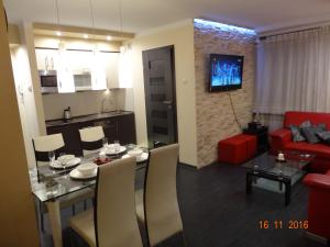 Posedenie v ubytovaní Apartament Kryształowy