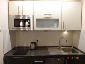 Kuchyňa alebo kuchynka v ubytovaní Apartament Kryształowy