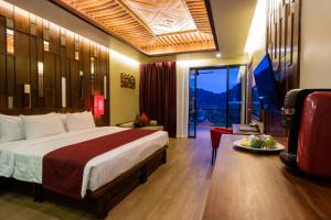 En eller flere senger på et rom på Aonang Phu Pi Maan Resort & Spa