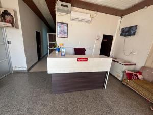 an office with a reception desk in a room at Hotel Laxmi Palace in Khātu