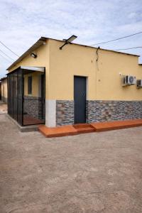 a building with a door on the side of it at Furnished Studio - Cite Progres in Djibouti
