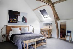 Postel nebo postele na pokoji v ubytování Chateau De La Resle - Design Hotels + 37 fotografií