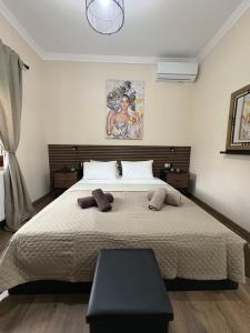 a bedroom with a large bed in a room at MP House Kassandrino Halkidiki in Kassandrinón