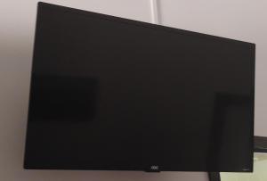 a flat screen tv sitting on top of a table at Pousada Casa Amarela in Ilhabela +64 photos