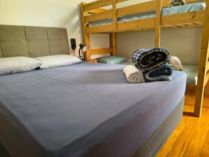 a bedroom with two bunk beds next to each other at Pousada Seu Jorge in Campinas
