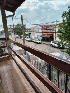 a balcony with a view of a parking lot at Pousada Seu Jorge in Campinas