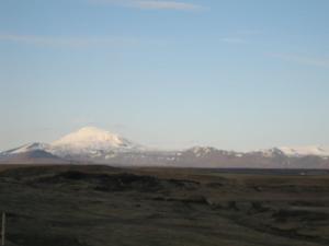 a mountain in the distance with snow covered mountains at Mid-Sel mountain view lodge in Hella +6 photos