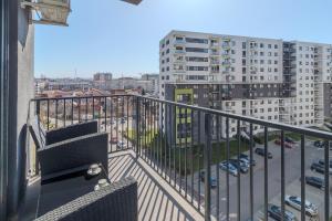 a balcony with a view of a parking lot at Honey Oak Residence in Oradea