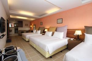 Postel nebo postele na pokoji v ubytování 小島旅店Island Inn
