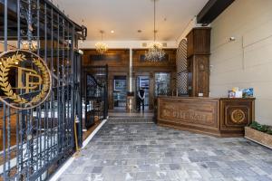 a entrance to a store with wrought iron gates at Hotel Du Parc in Medellín